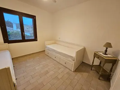 Letto o letti in una camera di RiganVìlla