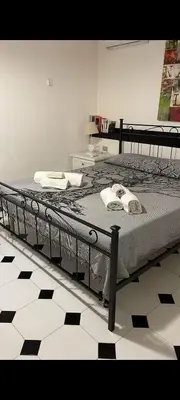 Letto o letti in una camera di Casa Micol