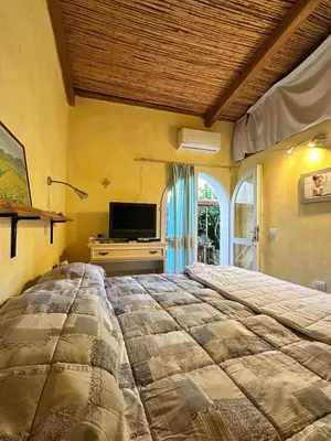 Letto o letti in una camera di Casa Valeria Wellore