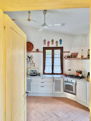Cucina o angolo cottura di Charming Cottage near Pula with Private Garden