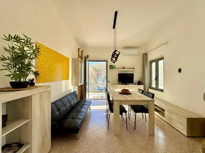 TV o dispositivi per l'intrattenimento presso Beach Breeze House
