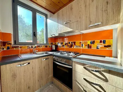 Cucina o angolo cottura di Beach Breeze House
