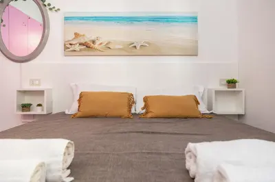 Letto o letti in una camera di Casa Ale in centro