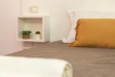 Letto o letti in una camera di Casa Ale in centro