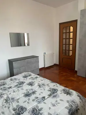 Letto o letti in una camera di Casa Liliana