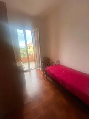 Letto o letti in una camera di Casa Liliana