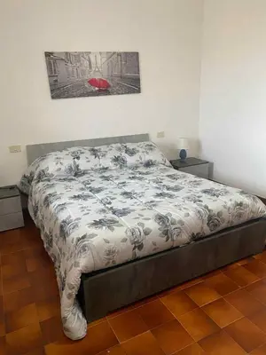Letto o letti in una camera di Casa Liliana