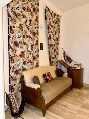 Area soggiorno di Sisters Guesthouse Cagliari Centro