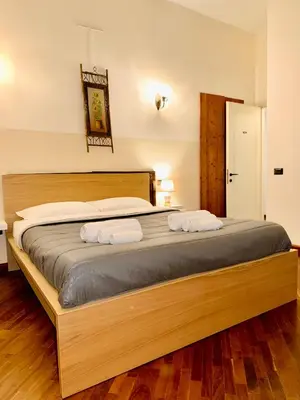 Letto o letti in una camera di Sisters Guesthouse Cagliari Centro