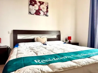 Letto o letti in una camera di Residenza del Barone Piano Nobile - Pula, Sardegna