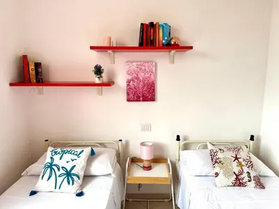 Letto o letti in una camera di Residenza del Barone Piano Nobile - Pula, Sardegna