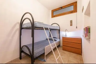 Letto o letti in una camera di Geremeas Country Club