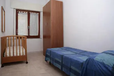 Letto o letti in una camera di Casa Forrola