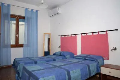 Letto o letti in una camera di Casa Forrola