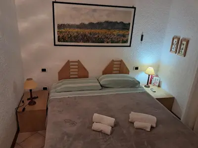 Letto o letti in una camera di Villa Rogio