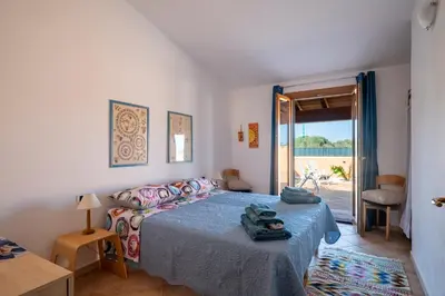 Letto o letti in una camera di Ri Ale Sa prassa