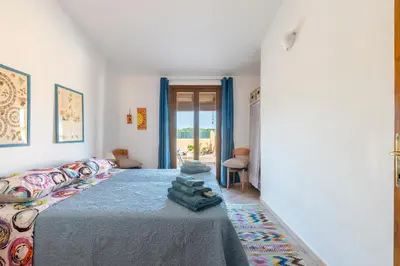 Letto o letti in una camera di Ri Ale Sa prassa