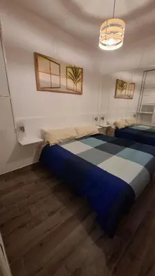 Letto o letti in una camera di Restituta Cozy Home