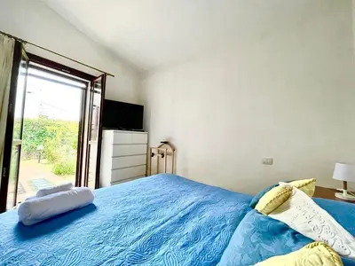 Letto o letti in una camera di Home Nicola Jago