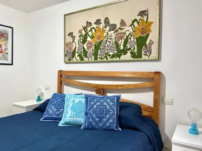 Letto o letti in una camera di Home Nicola Jago