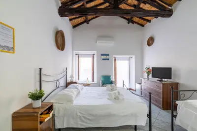 Letto o letti in una camera di Mini Suite in the Heart of Cagliari Center