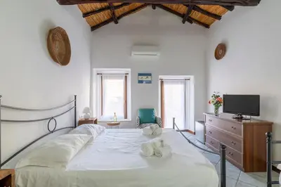 Letto o letti in una camera di Mini Suite in the Heart of Cagliari Center