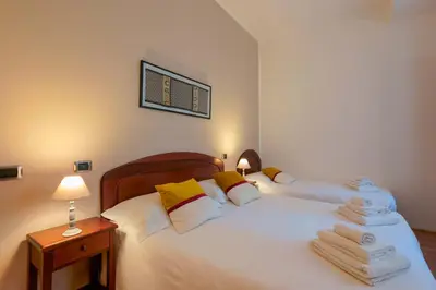 Letto o letti in una camera di Sa Domu Cheta