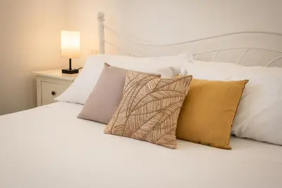 Letto o letti in una camera di Dreamy Villa - Elegante a 3 minuti a piedi dal Mare- wi-fi e parcheggio privato