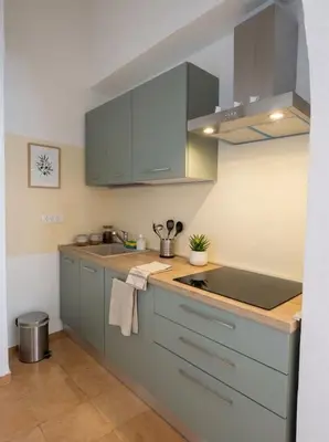 Cucina o angolo cottura di QQMura house in centro