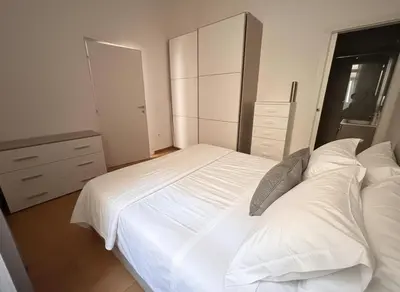 Letto o letti in una camera di QQMura house in centro