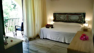 Letto o letti in una camera di Hotel Costa dei Fiori