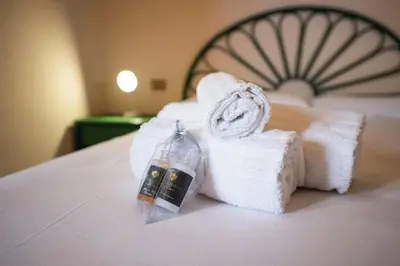 Letto o letti in una camera di Villetta Smeraldo, indipendente con giardino in zona residenziale