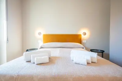 Letto o letti in una camera di Tuveri Boutique Apartment