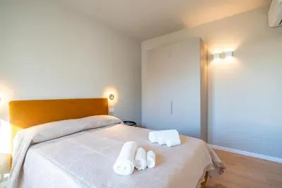 Letto o letti in una camera di Tuveri Boutique Apartment