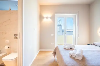 Letto o letti in una camera di Tuveri Boutique Apartment