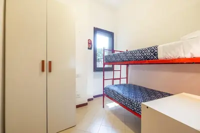Letto o letti in una camera di Casa Nola
