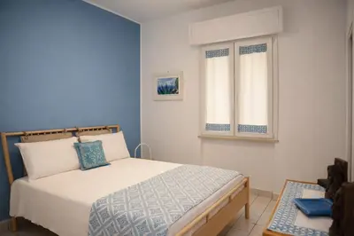 Letto o letti in una camera di Le Monachelle Luxury Apartment in Villasimius