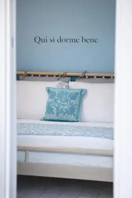 Area soggiorno di Le Monachelle Luxury Apartment in Villasimius
