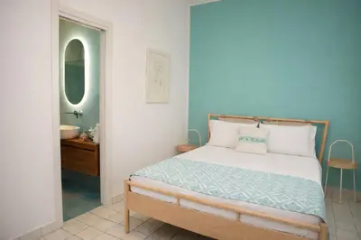 Letto o letti in una camera di Le Monachelle Luxury Apartment in Villasimius