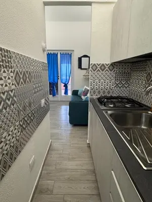 Cucina o angolo cottura di Casa Charlie, vista mare a 2 passi dalla spiaggia