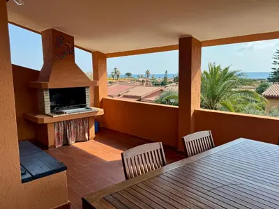 TV o dispositivi per l'intrattenimento presso Casa Charlie, vista mare a 2 passi dalla spiaggia