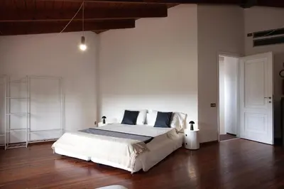 Letto o letti in una camera di Villa immersa nel verde vicino Cagliari Mare Natura Relax