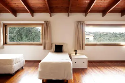 Letto o letti in una camera di Villa immersa nel verde vicino Cagliari Mare Natura Relax