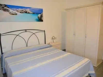 Letto o letti in una camera di Apartment Wohnung Mirto by Interhome