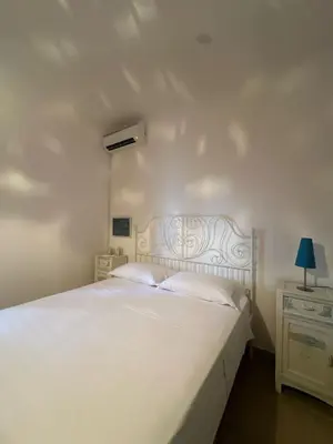 Letto o letti in una camera di Bouganville Bianco