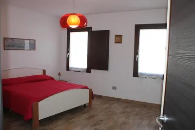 Letto o letti in una camera di Casa Carlotta