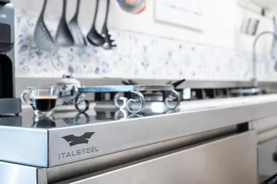 Cucina o angolo cottura di Corte Luna Solanas Terrazza e Panorama Relax