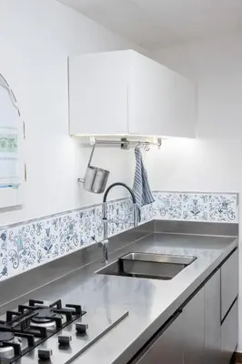 Cucina o angolo cottura di Corte Luna Solanas Terrazza e Panorama Relax
