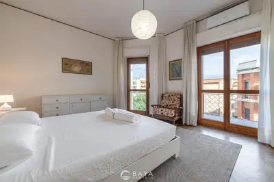 Letto o letti in una camera di Appartamento Generale