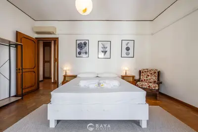 Letto o letti in una camera di Appartamento Generale